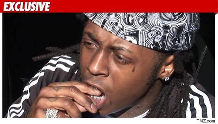 Hurricane Katrina Blamed in Lil Wayne Paternity Suit :: 1115-lil-wayne-tmz-ex-credit