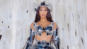 Kim Kardashian Shows Off Halloween Costume, Sexy Space 'CowBot'