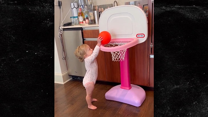 Patrick Mahomes' 1-Year-Old Daughter Shows Off Basketball Skills, Adorably Dunks Ball.jpg
