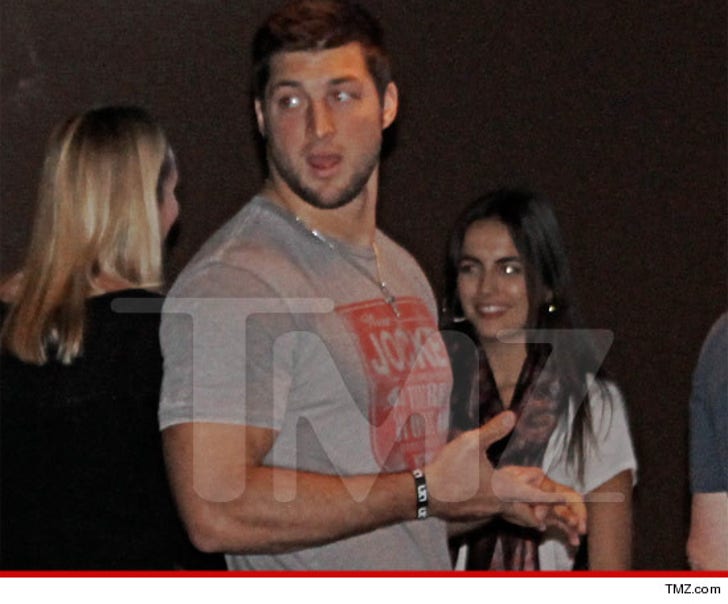 Tim Tebow -- You Be the Judge :: 1102-tim-tebow-camilla-belle-tmz-3