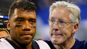 Russell Wilson Denies Wanting Pete Carroll Fired, Father Figure To Me