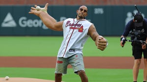 Ludacris Throwing Out The First Pitch With Exaggerated Arms And Shoes