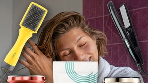 Woman Doing Her Hair With Products Around Her