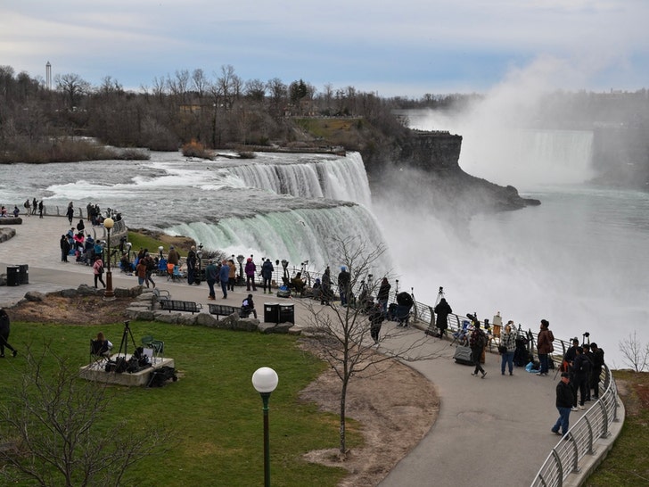 People Gather At Niagra Falls For The Eclipse