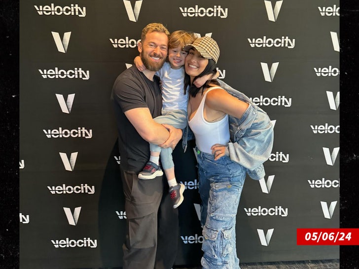 Nikki Bella and Artem Chigvintsev with their son