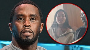 diddy and mystery woman getty tmz 1