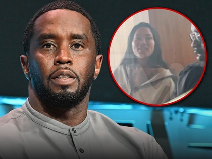 diddy and mystery woman getty tmz 1