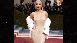 Kim Kardashian Wears Iconic Marilyn Monroe Dress To Met Gala with Blonde Hair