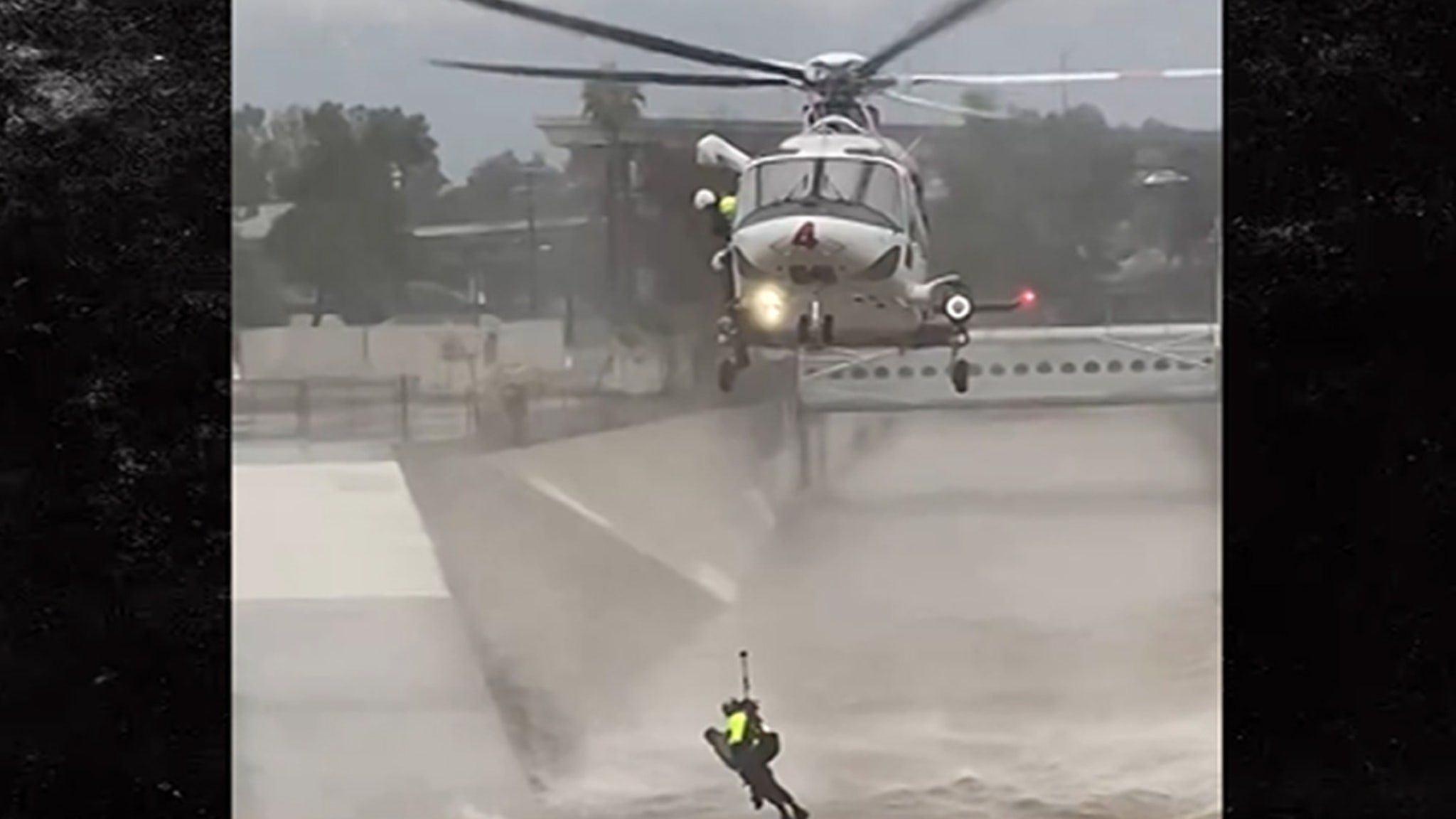 LAFD Uses Helicopter to Rescue Man and Dog from L.A. River During Storm