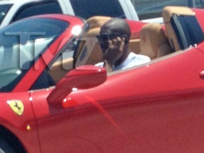 kobe_bryant_ferrari_cell_phone_wm_0110
