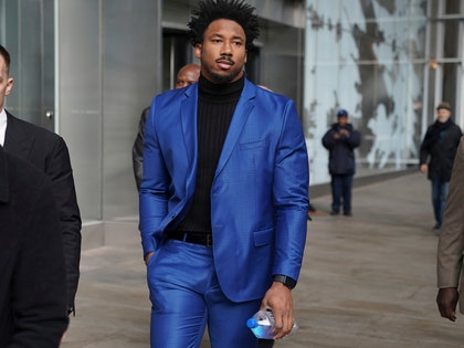 1120 Myles Garrett leaves an office building in New York shutterstock