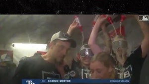 Rays Players Take Beer Showers In Background of Interview After Wild Card Win