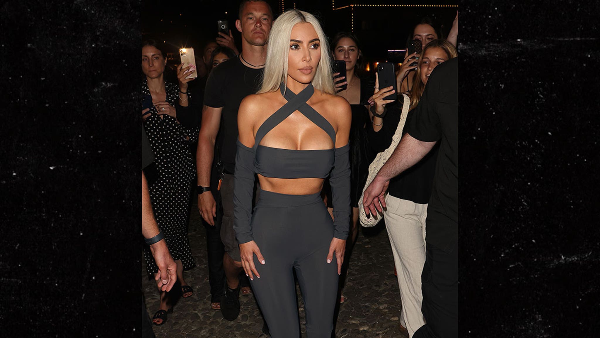 Kim Kardashian Arrives in Italy for Kourtney's Wedding thumbnail