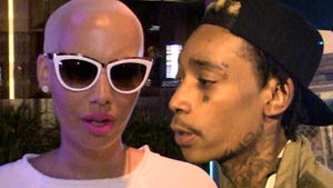 Amber Rose Divorce ... She Says Wiz Khalifa is a Serial Cheater