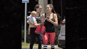 Nikki Bella Hits the Gym with Her Sister and Her Niece