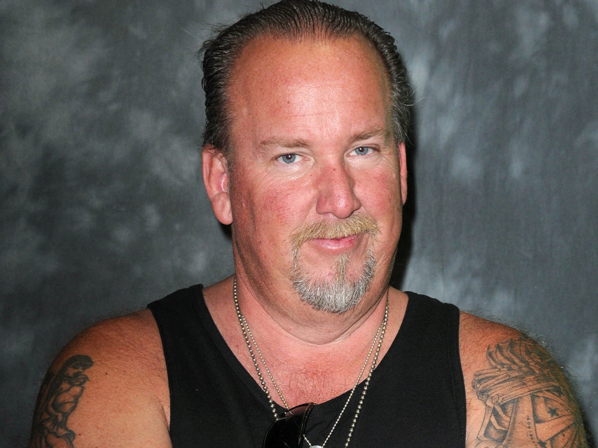 Storage Wars logo and Darrell Sheets