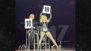 Pamela Anderson Joins Madonna Onstage at Vancouver Concert