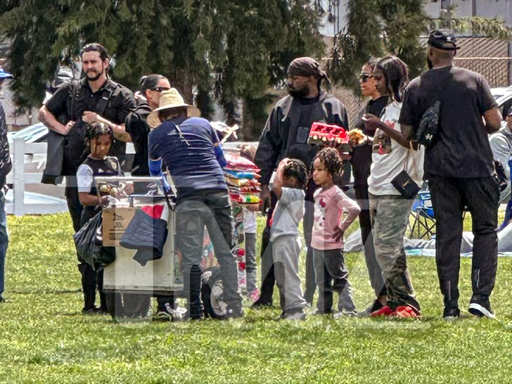 Kim Kardashian and ex-husband Kanye West keep their distance as they co-parent at son Saint?s�soccer�game (photos)