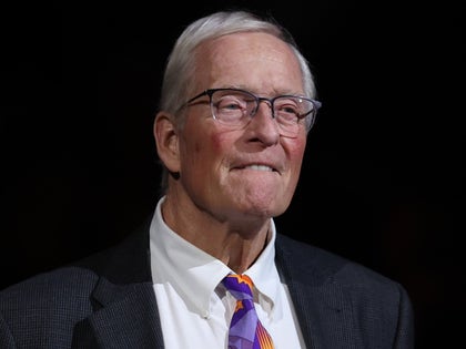 Dick Van Arsdale Wearing Glassing And A Purple And Orange Tie