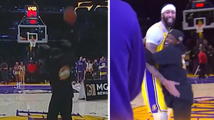 Lakers Fan Wins $75,000 After Hitting Epic Half-Court Shot, Hugs Anthony Davis!