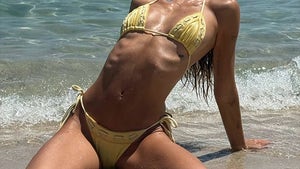 0325-Delilah-Belle-Hamlin-Yellow-Bikini-Guess-Who-hero