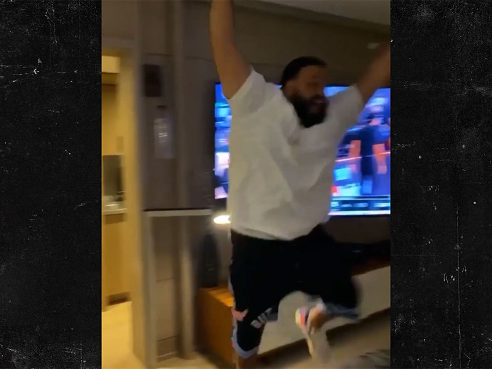 Dj Khaled standing on LV Pillows at the Miami Heat Game 