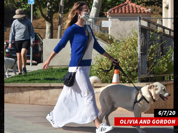 Olivia and Gordon walking dog
