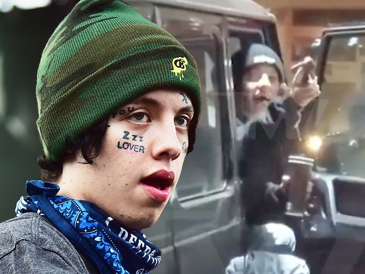 Lil Xan with a firearm