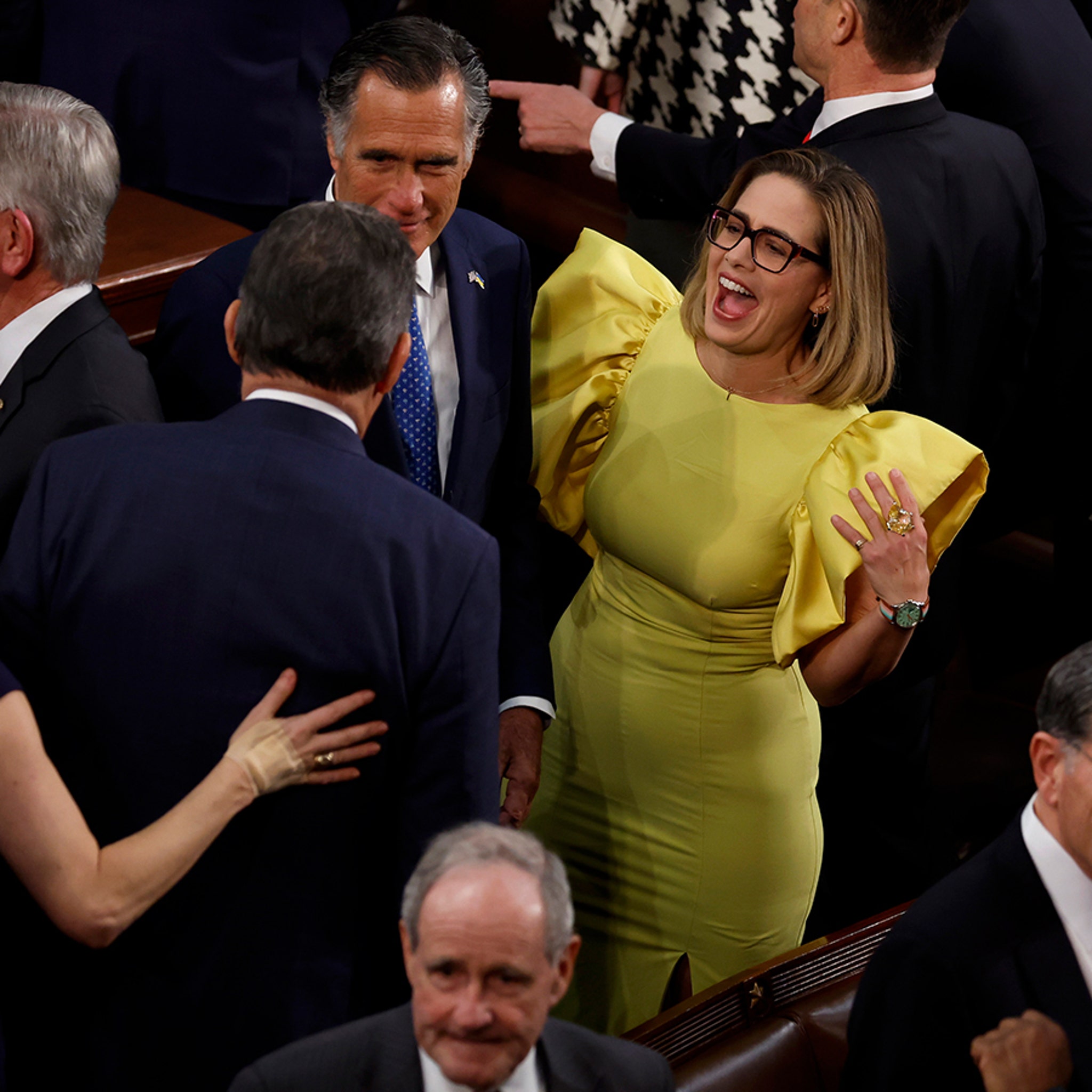 kyrsten sinema yellow dress