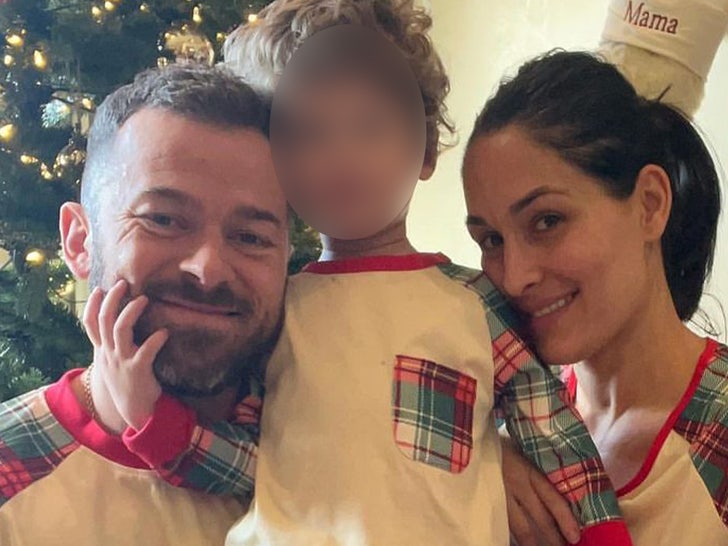 Nikki Bella Artem with their son