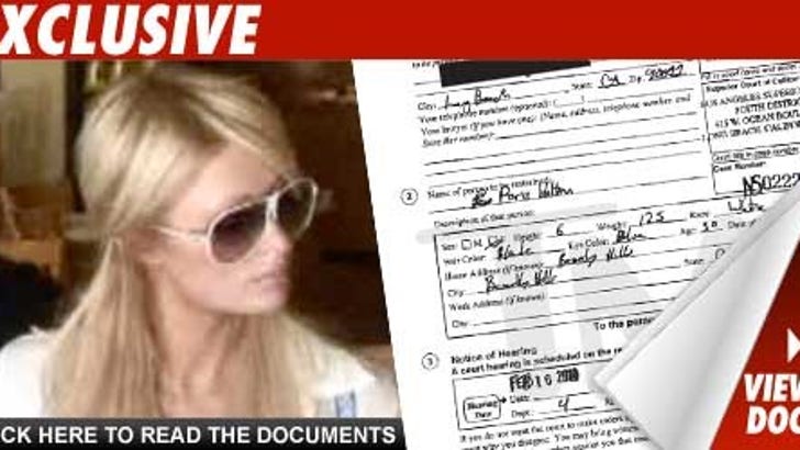 Paris Hilton Hit with Barely Legible TRO