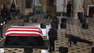 Ruth Bader Ginsburg's Trainer Does Push-Ups in Front of Her Casket