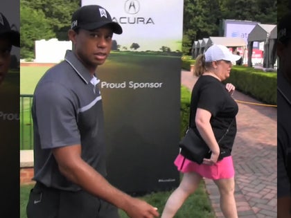 072915_tiger_woods_primary