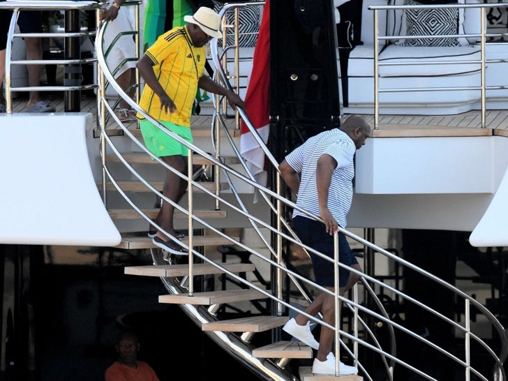 Samual L. Jackson And Magic Johnson On A Yacht