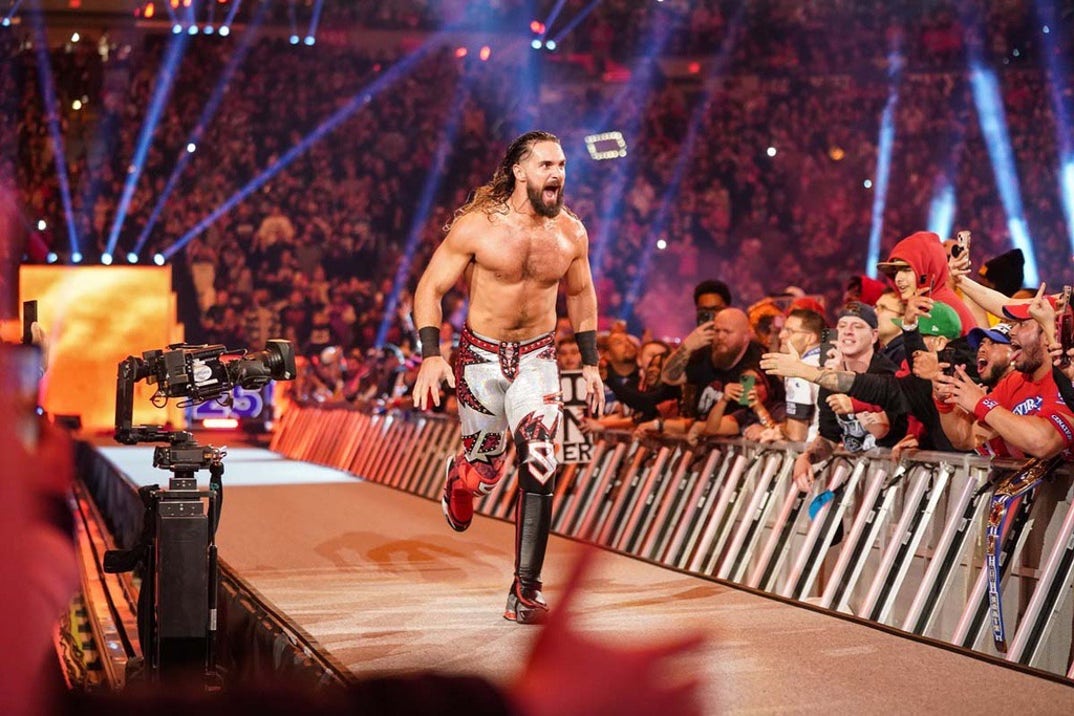 Seth Rollins runs into the ring at #25.
