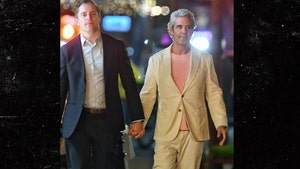 Andy Cohen holds hands with guy in NYC image direct 2