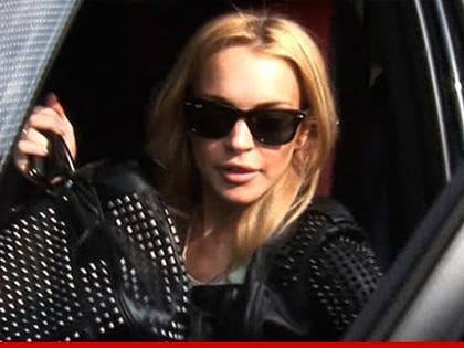 0609_lindsay_lohan_tmz_car
