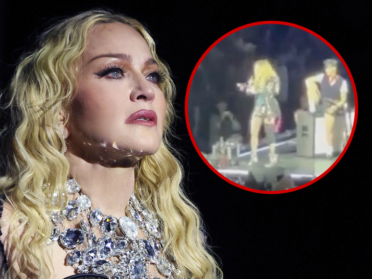 Madonna y fan en silla de ruedas