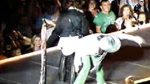 Aero Assault -- Perry Shoves Steven Tyler Off Stage