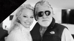 Pamela Anderson, New Hubby Producer Jon Peters First Pic Together