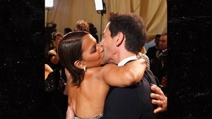 Halle Berry plants a huge kiss on Adrien Brody on the red carpet of the 2025 Oscars