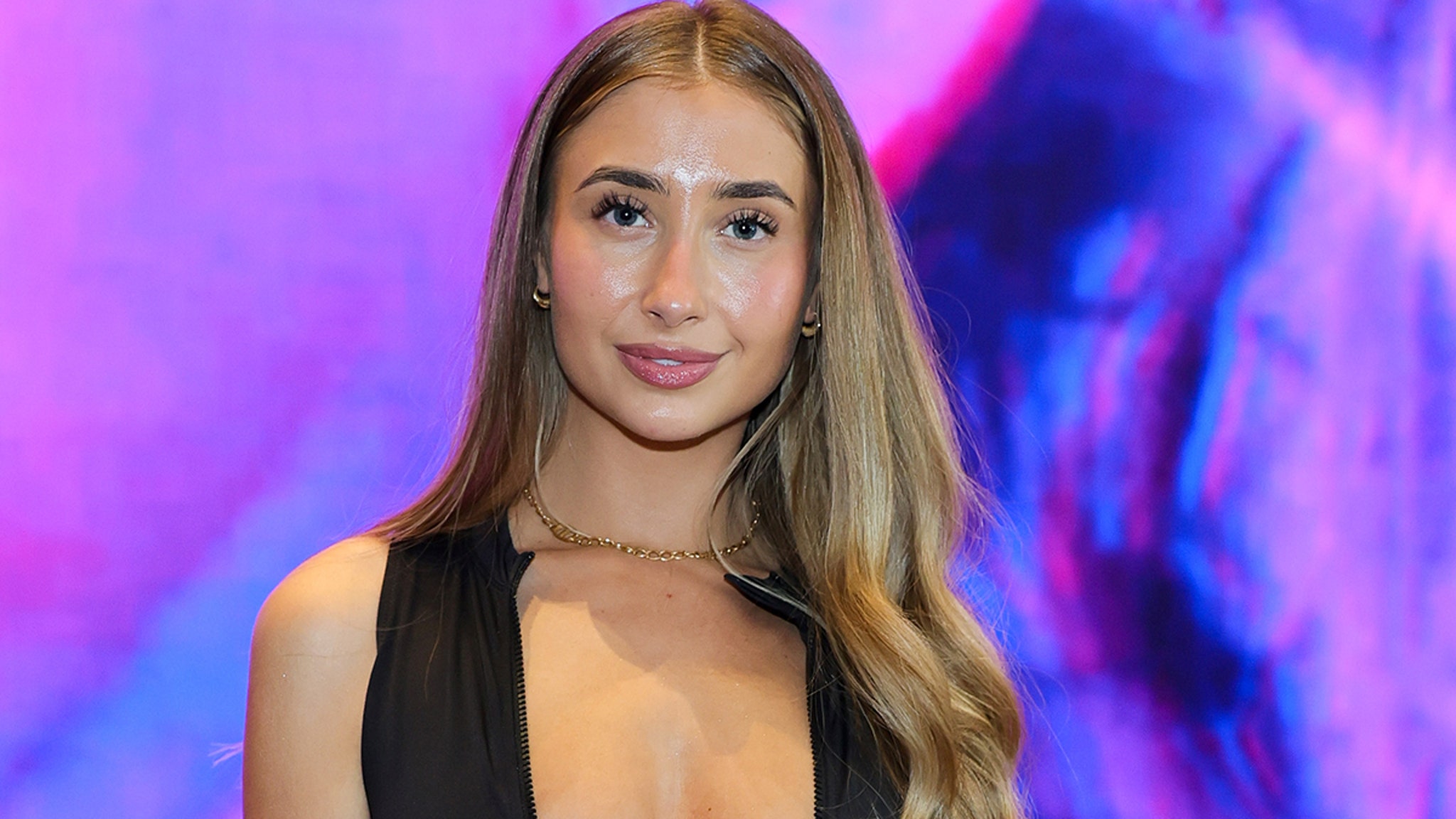 Porn Star Lily Phillips Plans to 'Sleep' with 10K Men in 24 Hours With Help From A.I.