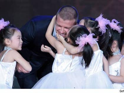 1126_beckham_beijing_getty-1