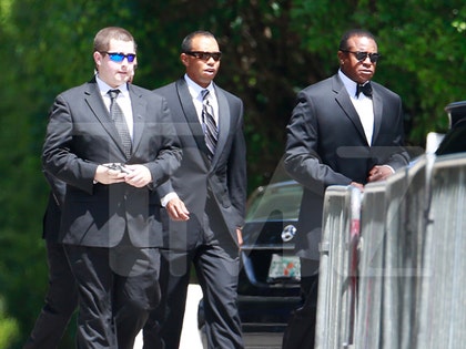 0428_tiger_woods_splash_wm