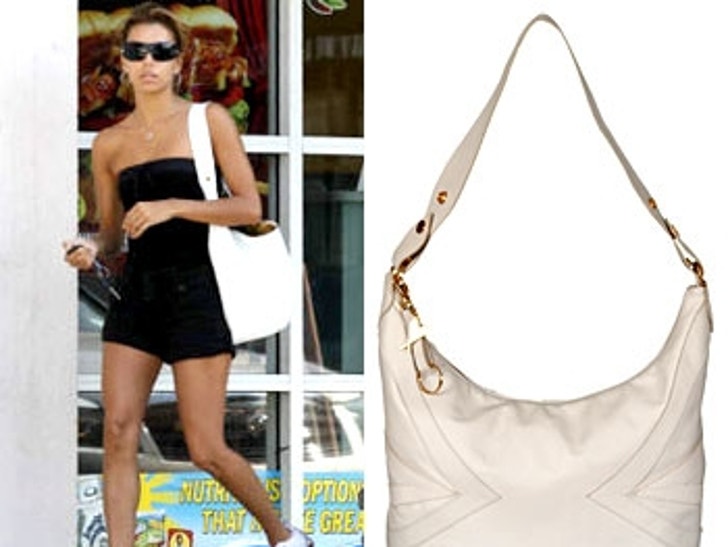 Eva Longoria with LULA purse