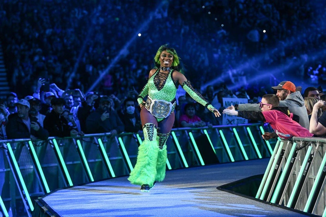 Naomi rocking tag team gold.