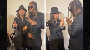 Offset Poses With Designer Yohji Yamamoto At PFW POUR HOMME Show