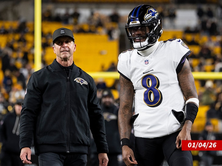 john harbaugh with lamar jackson getty