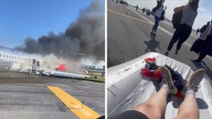 Video Shows Passengers Escape Burning Plane As Landing Gear Collapses