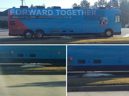 1019-hillary-clinton-bus-sewage-MIKE-ROBINS-01